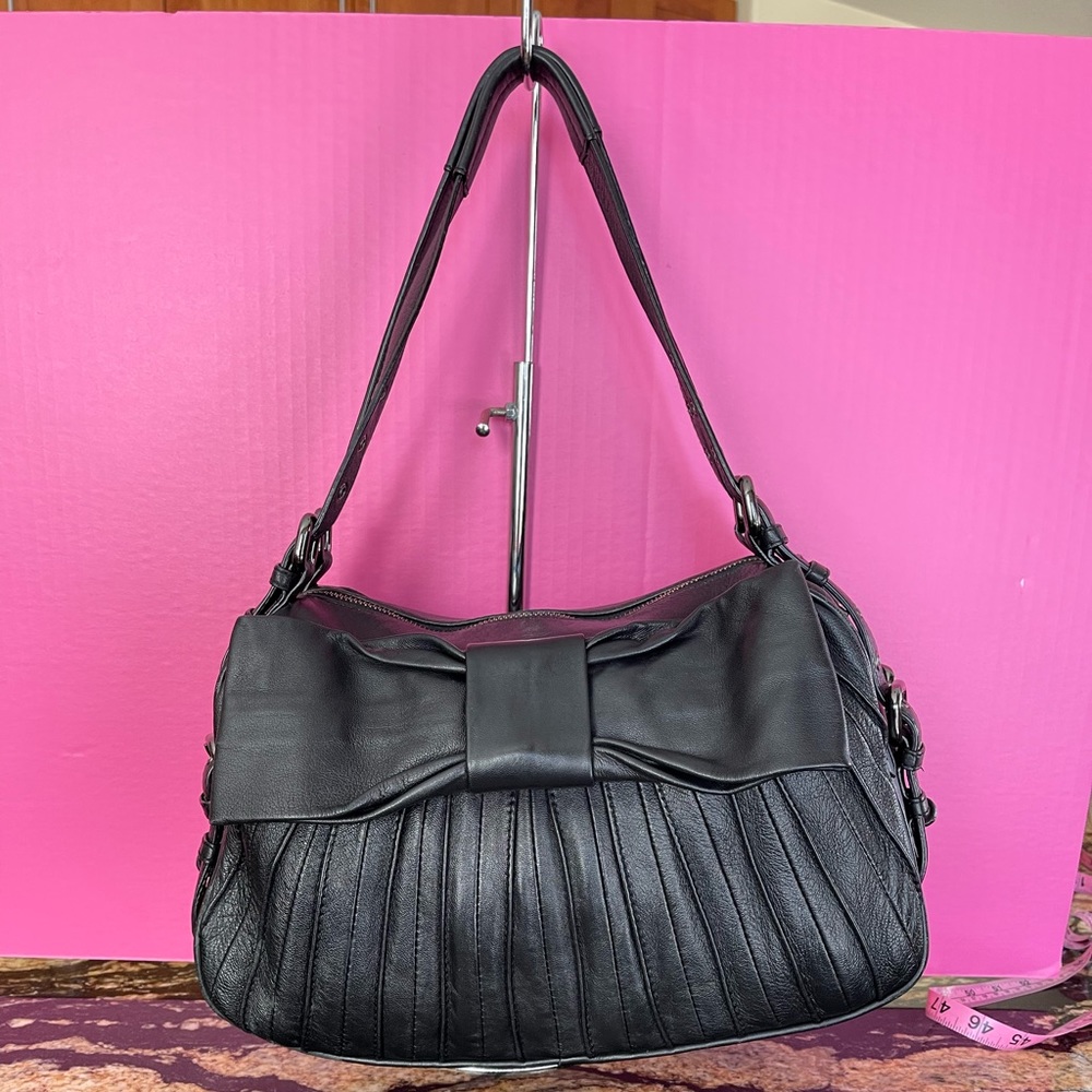 Betsey Johnson VINTAGE black leather shoulder bag with bow. Dust bag included.